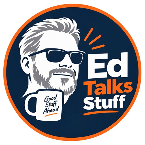 Circular logo with an orange border set against a dark blue background, featuring a stylized graphic illustration of a man with sunglasses, a beard, and styled hair. He is holding a white mug that reads "Good Stuff Ahead" in front of him. To the right, bold text reads "Ed Talks Stuff" in white and orange lettering.